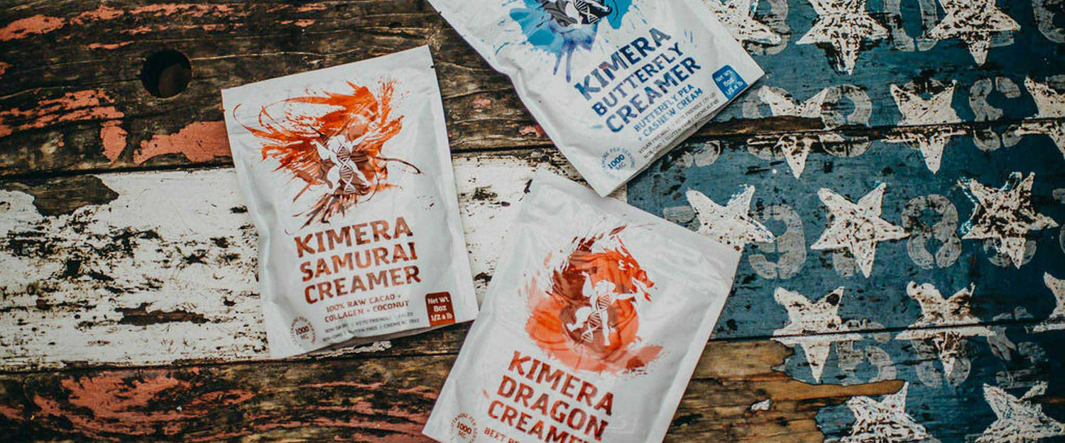 Kimera Creamer packets on a painted wooden table