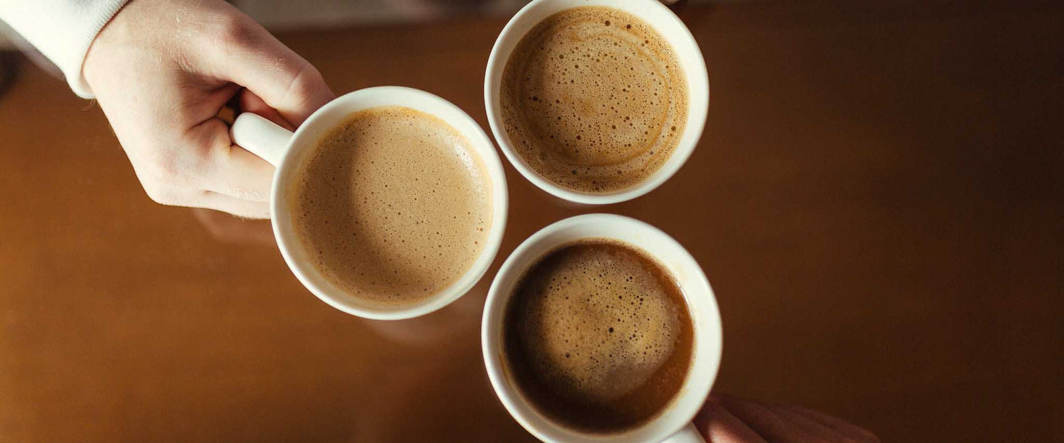 Collection of various drinkware items, including mugs, cups, and bottles